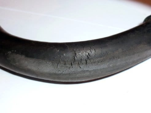 A deteriorated Toyota forklift radiator hose 